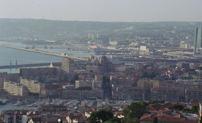 A coastal citys skyline focusing on a cathedral