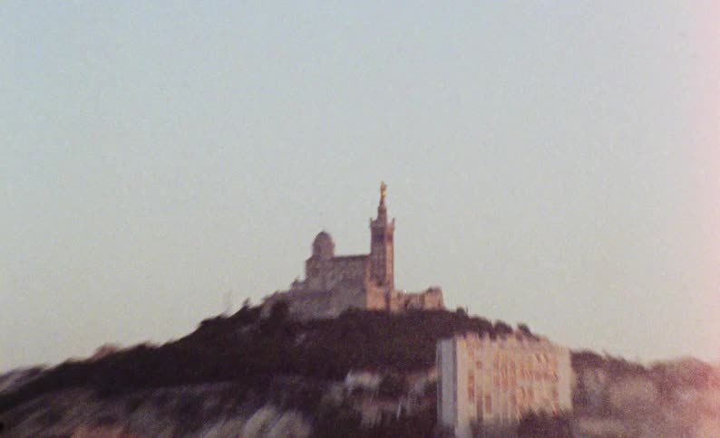 Panorama of an urban city and a cathedral in the background on the hill