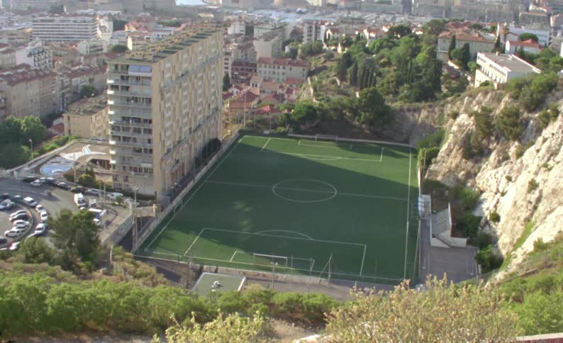 A football field in the middle of a big city