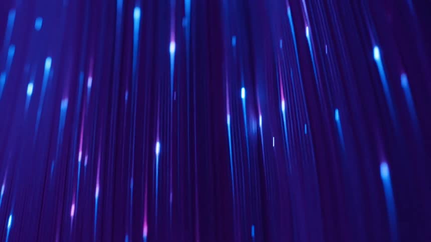 An object with various blue and violet colors is rotating
