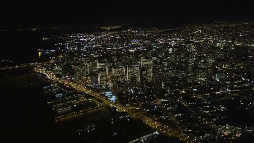 The city is brightly lit at night