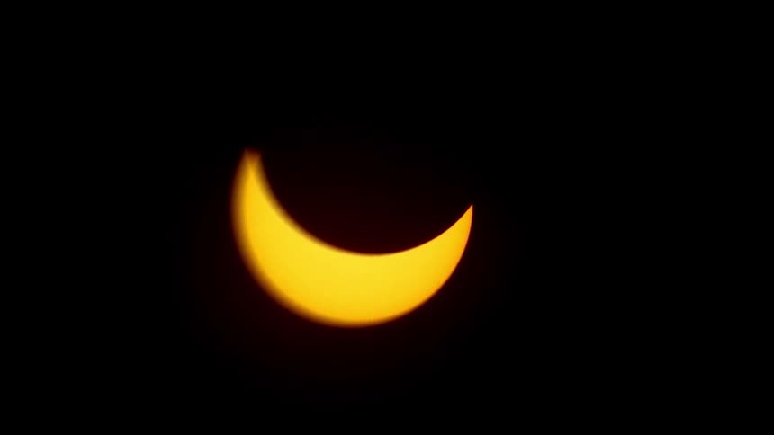 The moon eclipses the sun