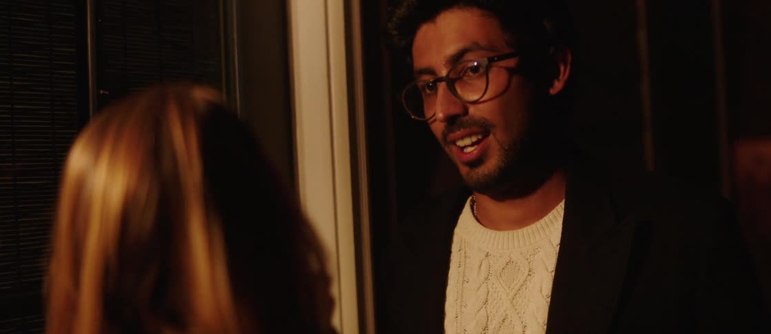Portrait of a man talking to a woman