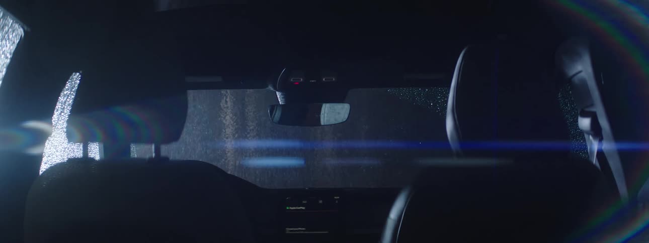 Interior of a car at night while raining