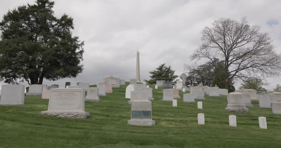 Panorama of a cemetery with a tombstones on a cloudy day
