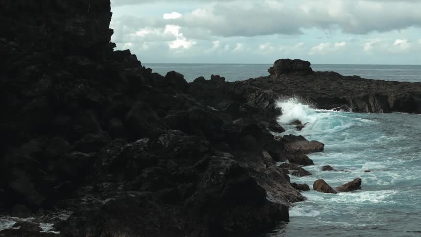 Waves smash into an extremely rocky coastal area