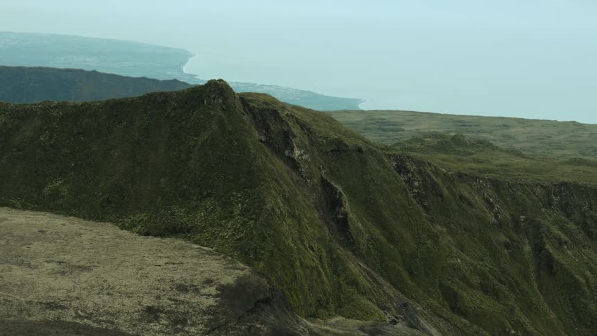 A large mountain and lava fields near Peak of the Furnace volcano