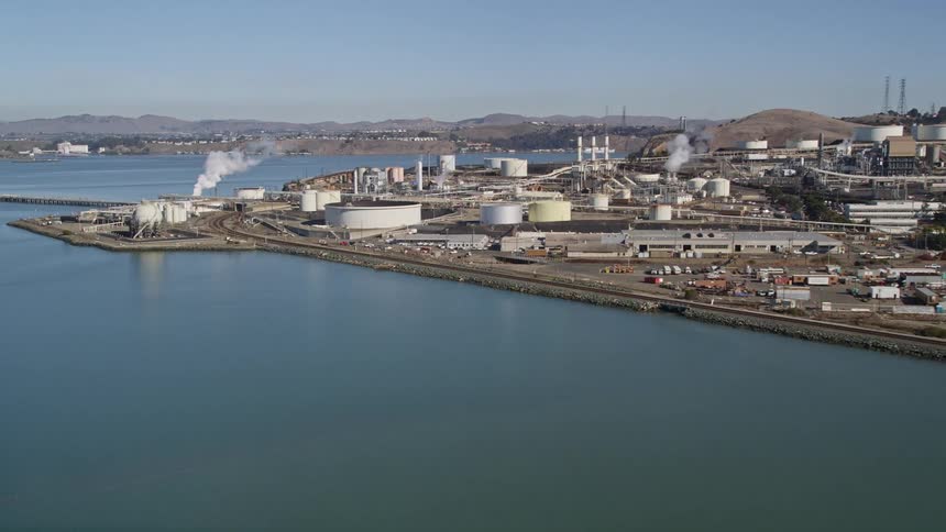 Aerial view of a clear day over a waterfront industrial complex