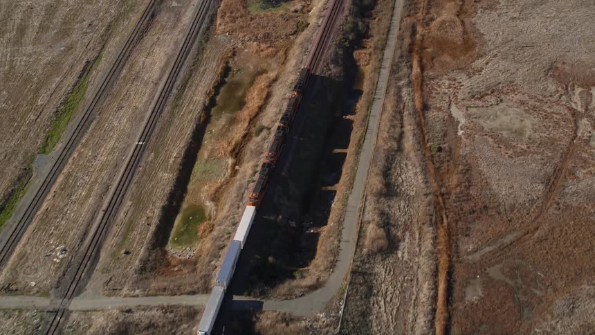 The train transports cargo containers