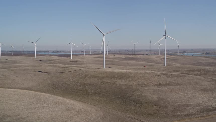 Windmills are covering the hills