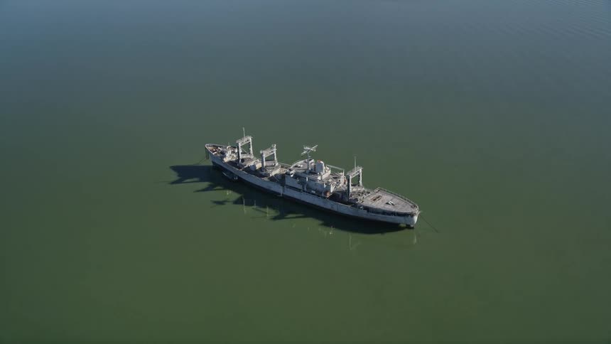 Aerial panorama of a military ship in the middle of the ocean
