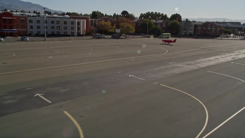 An airport with planes sitting on the tarmac