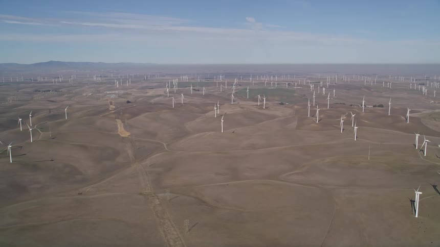 Aerial view of a wind turbine farm