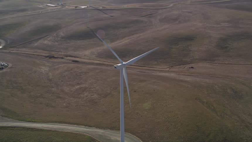 A footage of a wind mill plantation in the desert