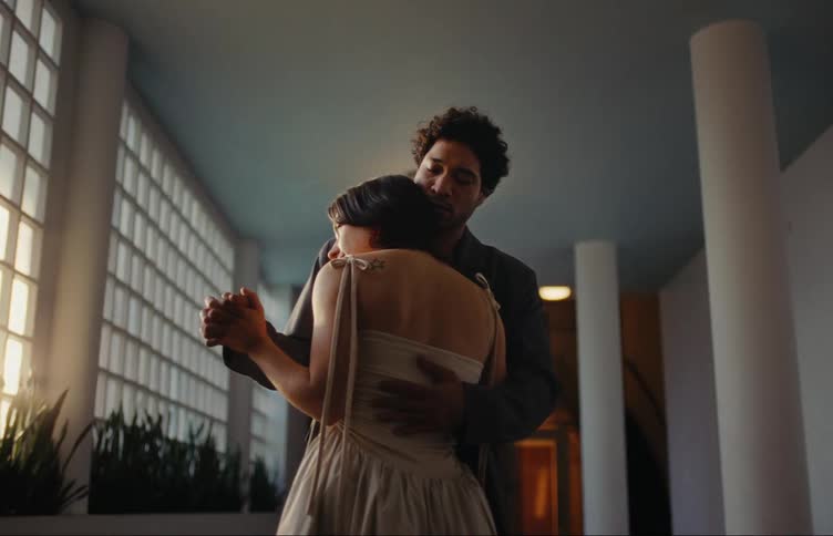 Man romantically hugging his partner and dancing