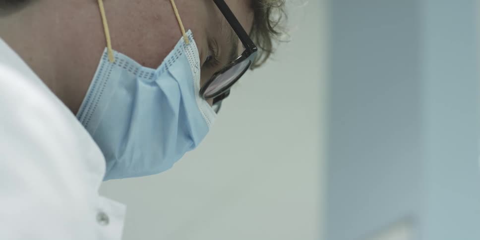 A medical professional works in a hospital