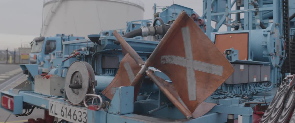 Truck with industrial equipment and tank