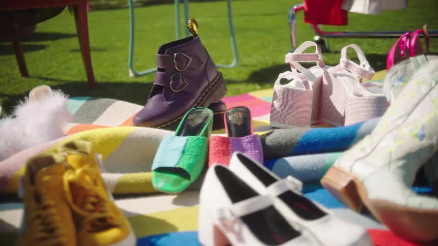 The blanket is full of shoes for sale