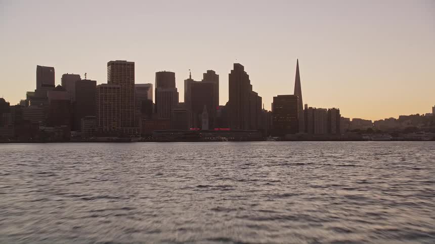 The san francisco city skyline at sunset