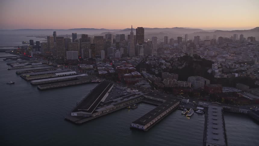 Aerial panorama of a seaside metropolis in the late afternoon