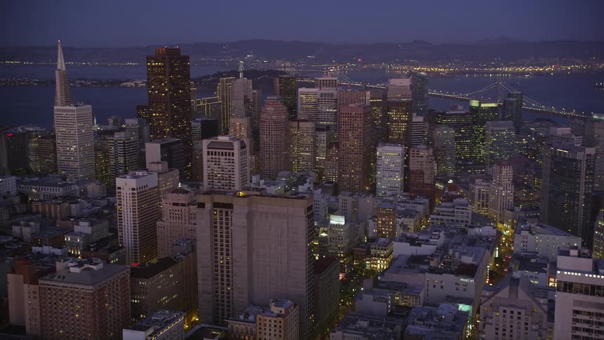 Traffic runs through the city at dusk