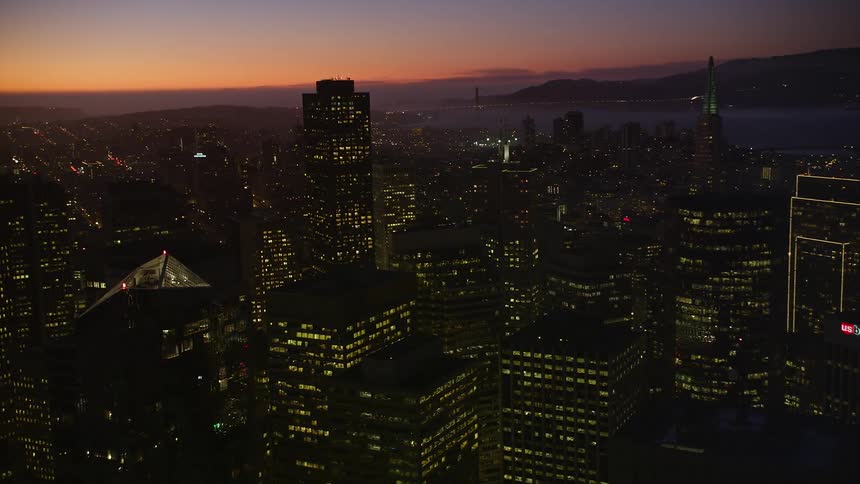 The sun is nearly set on the city