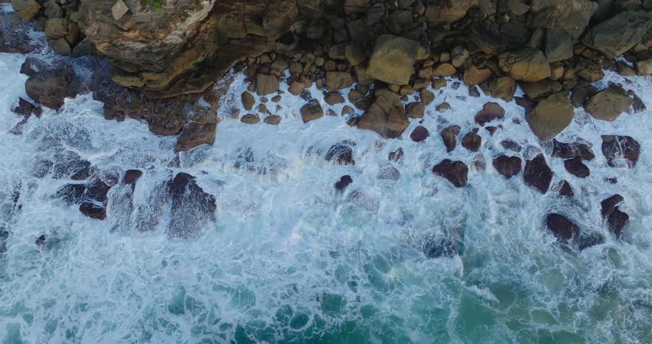 Strong waves batter a rocky shore