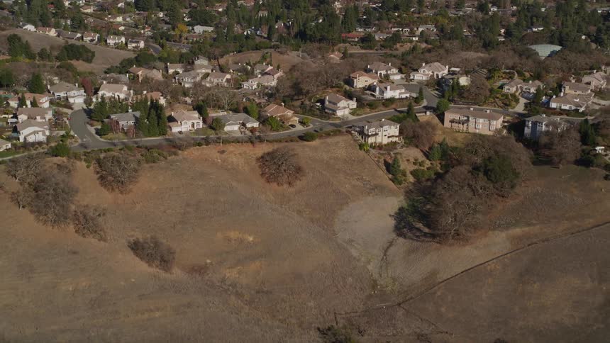 Aerial panorama of a residential neighborhood in hills