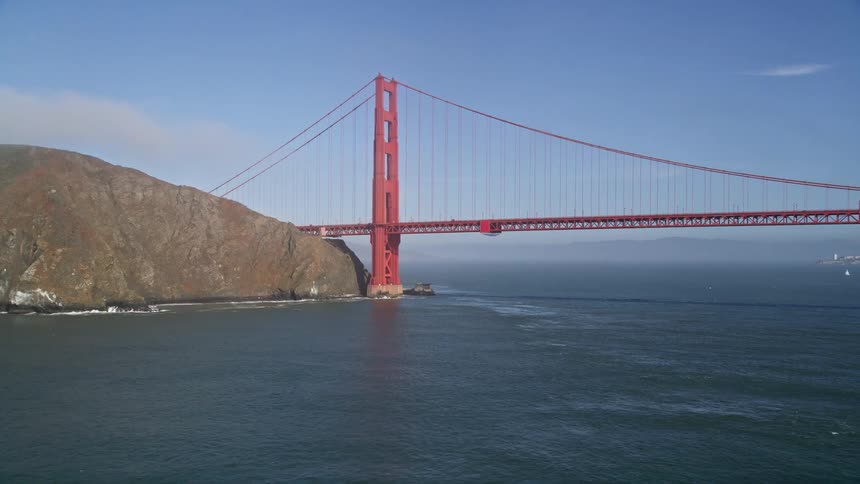 Aerial scenery of the golden gate bridge over the sea on a clear sky day
