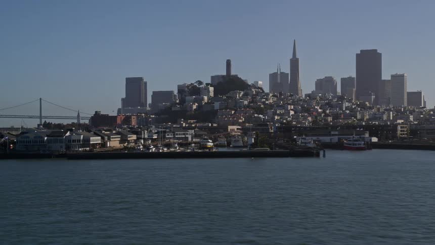 Panorama of a metropolis with large buildings and skyscrapers by the sea