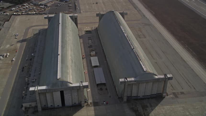 Aerial panorama of airstrips and adjacent warehouses