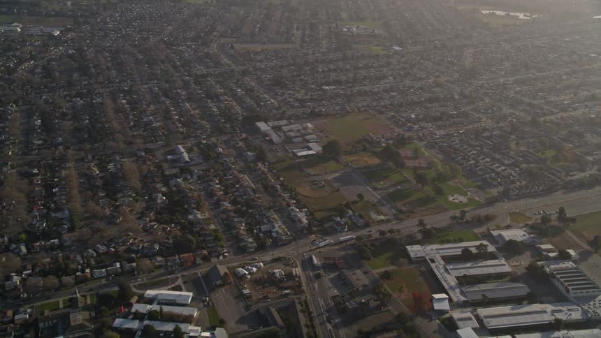 An aerial view of a suburban neighborhood at morning