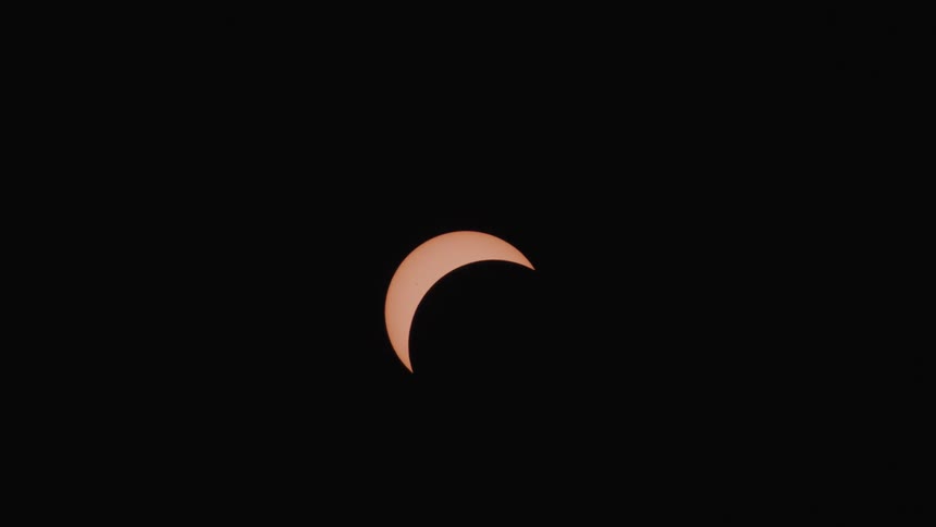 The sky is black during the eclipse