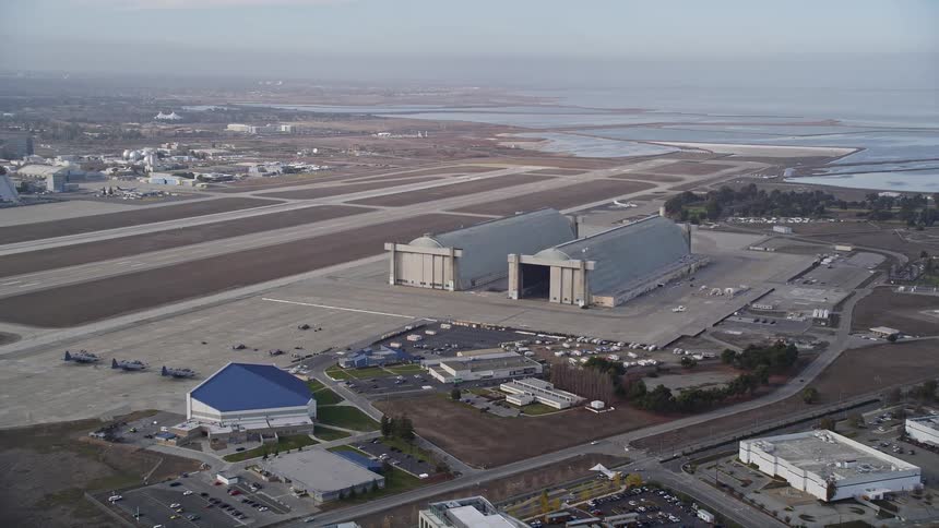 Airplane hangers are near the factories