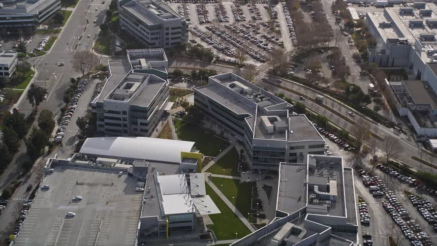 A swampy area gives way to a large city business park