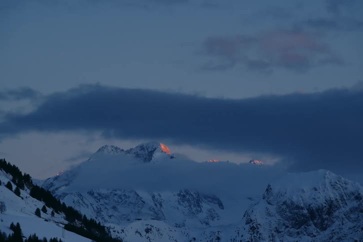 Landscape of mountain range covered with snow