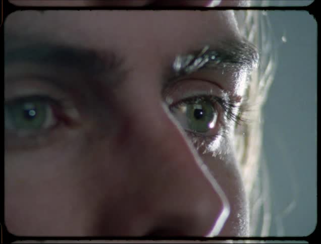 A woman blinks her eyes