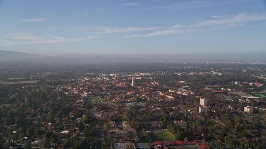 Aerial view of the stanford university campus and surrounding city skyline