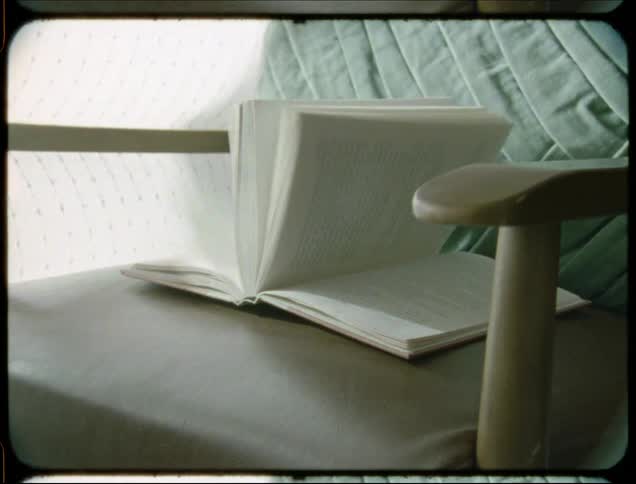 A footage of a book on the chair