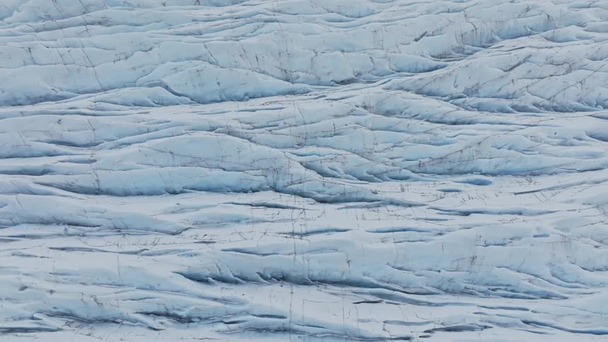 Heavy snow and ice on a grassy area