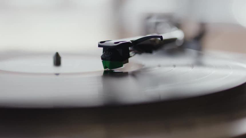 Closeup of a vinyl record being played