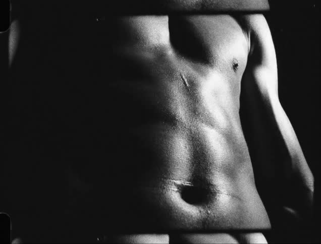 Portrait of a man without a shirt with a serious facial expression