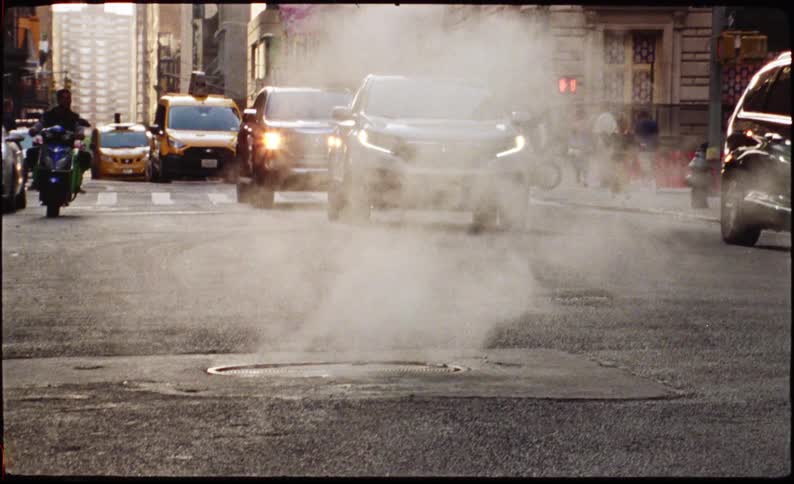 Traffic on a busy new york city street at morning