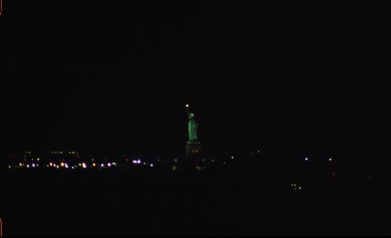 The statue of liberty in new york city light up at night