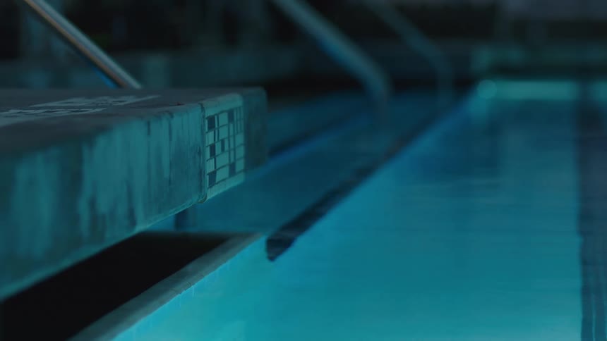 The edge of an interior swimming pool