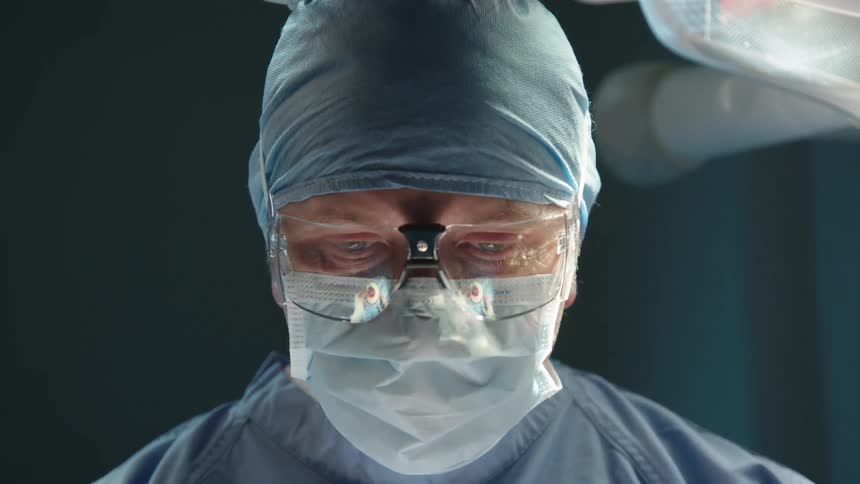 Portrait of a doctor concentrating on a surgical procedure