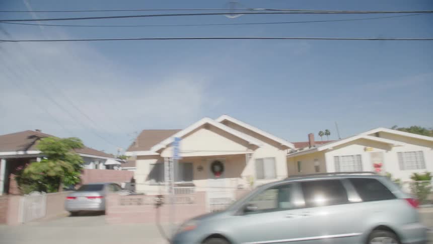 Cars parked along a suburban street