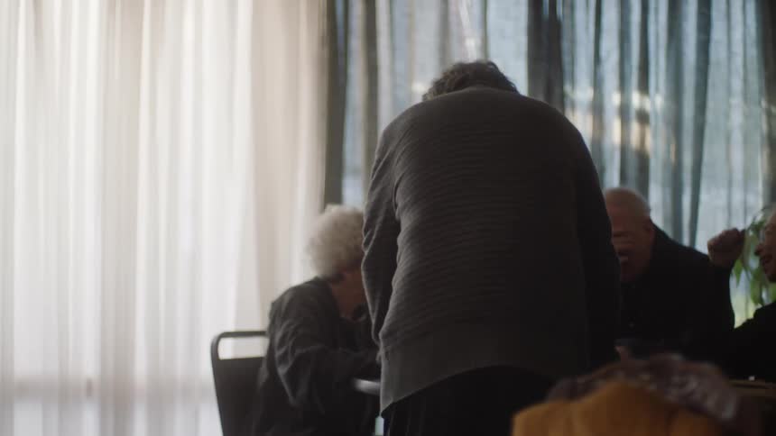 People sitting at a table laughing