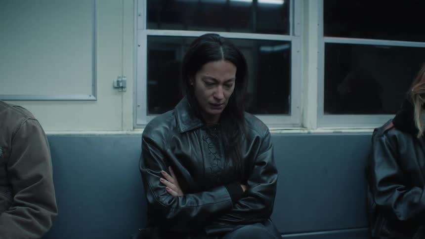 A woman crying in the subway