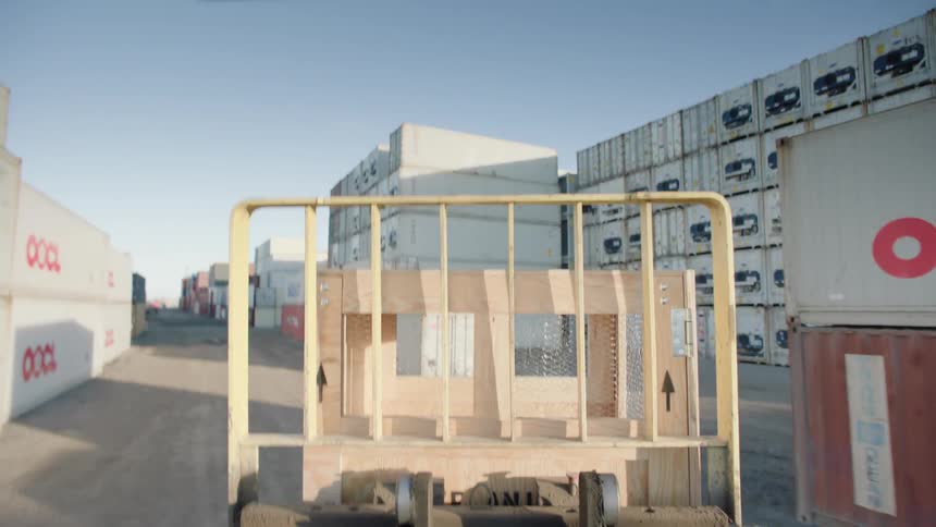A forklift moving around a job site